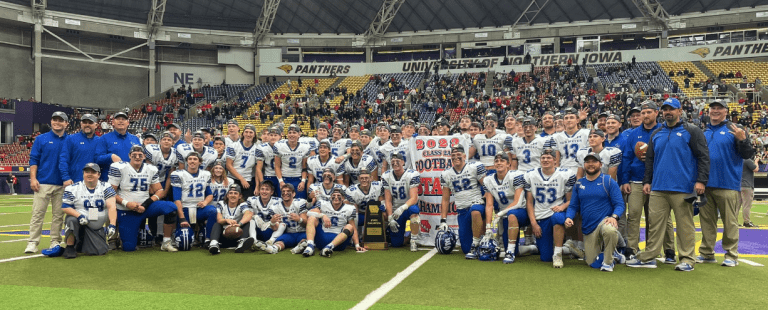 Van Meter Football Team group photo after winning a state championship.